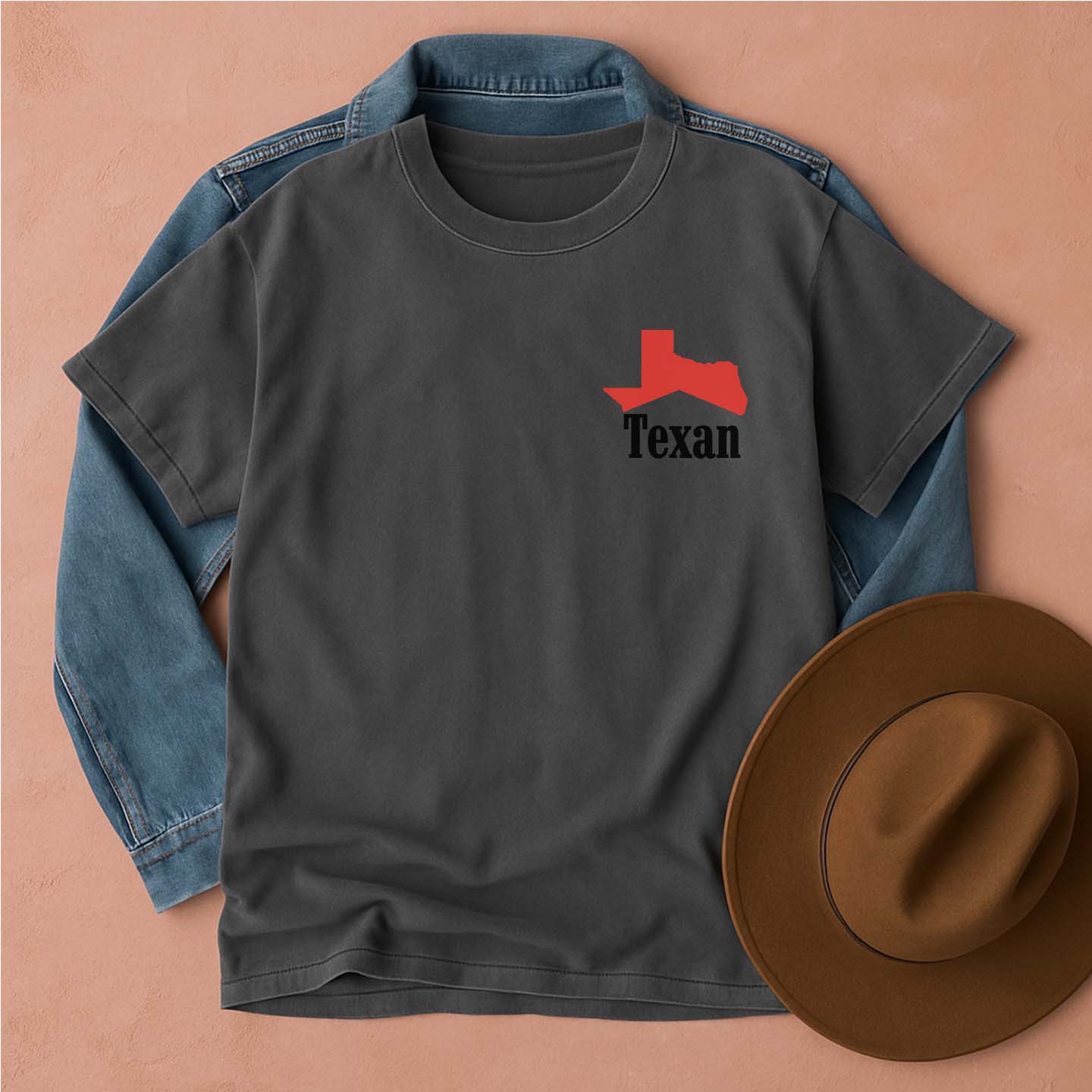 Gray t-shirt with red and black Texan graphic, blue denim jacket, and brown, front view