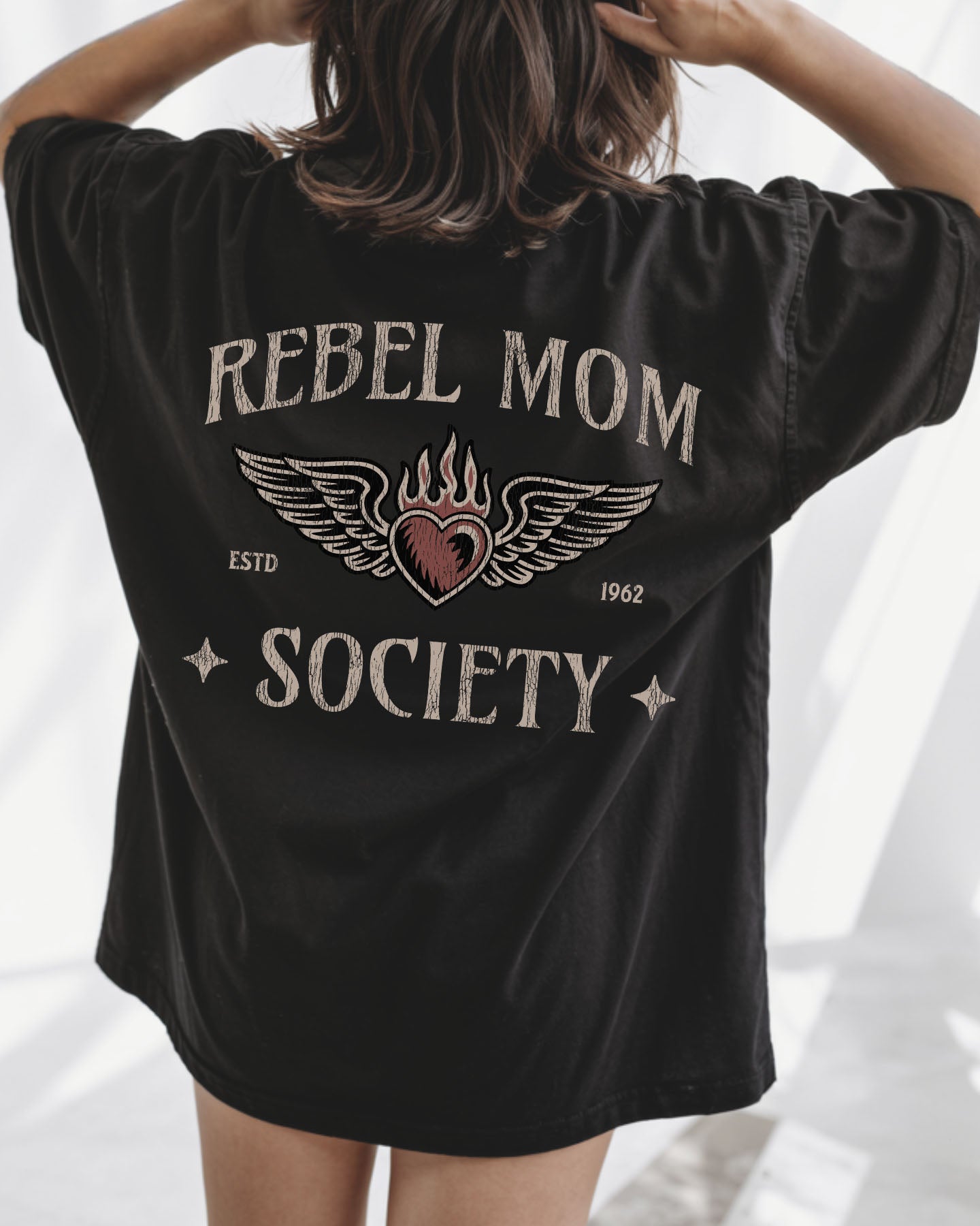 Black Comfort Colors t-shirt with 'Rebel Mom Society' design on the back