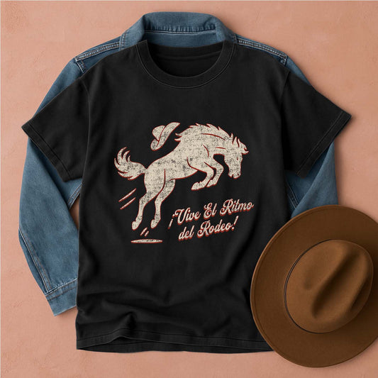Black t-shirt with horse graphic and text, denim jacket, and brown hat on a beige background